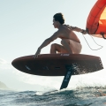 F-One Rocket Midlength board being ridden with a wingfoil in the sea