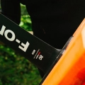F-One UHM Carbon Mast 12 close up on orange wing board